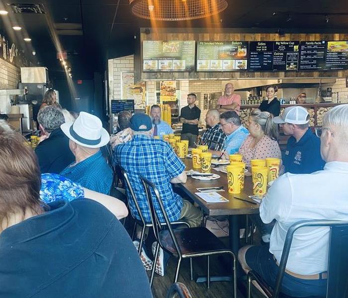 Group eating lunch yellow cups